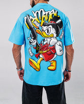 Camiseta Oversize Tío Rico GU$N